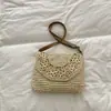 Bolsa Estilo Étnico Boêmio Transfronteiriça para Mulheres 2026 Nova Bolsa de Celular Tecida Vazada Bolsa de Praia para Férias na Praia