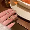 Pendientes Metálicos Populares de Nicho de Alta Gama para Mujer, Moda Coreana, Lujo Ligero, Versátiles, Elegantes Pendientes de Aro Mate