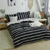 Nuevo engrosado lijado cuatro piezas dormitorio estudiantil tres piezas simple agradable a la piel funda de edredón sábanas ropa de cama al por mayor