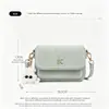 Bolsa Transversal GDCK Verde Claro Similar a Camurça com Pingente de Monstro para Mulheres