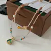Nuevo Collar de Perlas de Cristal de Fresa Estilo Chino para Mujer 2025 Nueva Cadena de Clavícula Apilada Lujo Accesible Collar de Estilo Antiguo de Gama Alta