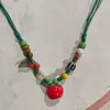 Collar con colgante de campana de mariposa de cerámica de estilo étnico retro para mujer, diseño nuevo y moderno, cadena larga para suéter, accesorios