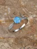 Anillo de ópalo bestseller transfronterizo con piedra principal redonda de seis garras y banda tachonada de diamantes