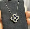 Collar de Trébol de Cuatro Hojas HaiRui HW Loop Colgante de Flor Hueca Diamante Completo Dorado V Cadena para Clavícula de Oro de 18 Quilates Fabricada con Precisión CNC para Mujeres