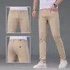 Jeans de alta gama color caqui de Tencel para hombre de Hong Kong, nuevos para primavera y otoño, corte ajustado, elásticos, versátiles, transpirables, pantalones casuales