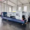 Torno CNC para roscar tubos com mandril duplo de 105 furos, máquina-ferramenta CNC grande para corte pesado com bancada integral CK6180