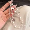 Cadena para Teléfono Móvil de Caballo Mecedora con Perlas Colgante de Muñeca para Mujer Joyería de Nicho Exquisita Correa Corta Hecha a Mano con Cuentas para la Mano