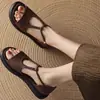 Sandalias de Tira Única con Punta Abierta de Gama Alta Verano 2025 para Mujer Sexy con Sandalias Romanas Estilo Nuevo Francés Suela Gruesa Huecas Falda