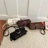 Bolso de axila de moda femenina transfronterizo, diseño de nicho, bolso para el trabajo, nuevo bolso versátil de hombro cruzado para mujer Otoño 2026