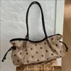 Bolso de gamuza para mujer 2026 nuevo moda de otoño nicho lunares bolso tote de trabajo de gran capacidad bolso de hombro