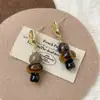 Pendientes Minimalistas Únicos y Sofisticados con un Estilo Genial, Presentando Piedra Ojo de Tigre y Diseño Maillard