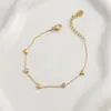 Pulsera Elegante de Moda Corazón Pequeño Circonita Azul y Blanca Acero de Titanio para Mujer Cadena Fina Exquisita Lujo Ligero Joyería de Mano Transfronteriza Corazón de Melocotón Cruz