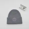 Chapéu Frio da Moda Chapéu de Lã Tricotado Rosto Sorridente Bordado Proteção Quente para Orelhas Chapéu Pulôver Colorido da Moda Mesmo Estilo para Homens e Mulheres