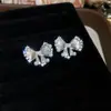Super conjunto de joyería de collar y pendientes de mariposa con perlas y diamantes, accesorios versátiles de lujo discreto al por mayor