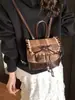 Bolso de Cuadros de Alta Gama para Mujer Transfronterizo Otoño e Invierno 2026 Nueva Moda Lazo Elegante Versátil Mini Mochila Tendencia