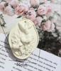 Tulipán rosa muñeca de yeso aromaterapia colgante blanco crudo hecho a mano arte de pintura ins puesto romántico al por mayor