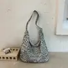 Bolso de mujer estilo casual 2026 nuevo otoño nicho súper popular estampado de leopardo bolso de hombro gran capacidad bolsa de mano para el día a día