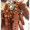 Colgante de Llavero Zodiaco Doce Animales de Madera de Durazno Adorno Tallado en Madera Llavero Portátil Anti-Pérdida Cuerda Tejida a Mano