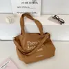 59261 Bolsa de Lona Estudante Feminina 2025 Nova Tendência Coreana Bolsa Tote com Letras Casual Grande Capacidade Bolsa de Compras