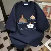 Camiseta de manga corta con estampado de dibujos animados lindos de seda de leche para parejas, top versátil holgado de verano para Instagram, estilo unisex