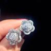 Pendientes de metal con forma de flor de Cao Shi, nuevos pendientes cóncavos-convexos de moda con forma de girasol, pendientes de estilo europeo y americano.