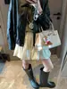 Moque Estilo Blogger Coreano Preguiçoso Retrô Listrada Gola Redonda Solta Casual Manga Longa Camiseta MQ1910