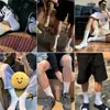Selección estricta Calcetines de algodón Zhuji blancos de media pantorrilla calcetines de verano de color sólido calcetines de barco calcetines deportivos de baloncesto calcetines de mujer calcetines de hombre al por mayor