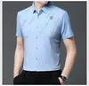 2023 Nueva Camisa de Manga Corta sin Marca para Hombre Camisa de Media Manga Elástica Moderna Forma de Z de Seda Helada para Hombre