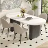 Mesa de comedor de color crema, moderna y lujosa con tapa de piedra para uso doméstico, con un diseño moderno y minimalista de forma ovalada negra, adecuada para comedores