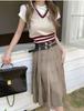 Chaleco de cuello en V en contraste para mujer, otoño e invierno, estilo coreano, sentido del diseño, estilo académico, sin mangas, chaleco tejido apilado