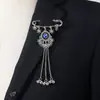 Nuevos accesorios de moda europeos y americanos transfronterizos: Broche estilo étnico bohemio con adornos de diamantes, elegante broche vintage de borlas