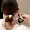 Anillo de pelo hueco con diamantes de imitación coreanos, cuerda para el pelo con perla para el intestino grueso, cuerda para la cabeza con cola de caballo de cristal con temperamento para mujer, cuerda de goma para tendón, accesorios para el cabello al por mayor