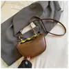Bolso de mano para mujer muy elegante y único, nuevo modelo de verano 2026, bolso tipo empanada de nicho de gran capacidad, bolso cruzado de color liso