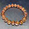 Pulsera de Cristal Rojo Natural Genuino para Hombres y Mujeres Joyería de Anillo Único para Hombres y Mujeres Pulsera de Cristal de Cabello Shun Fábrica al por Mayor