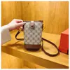 Bolso tipo cubo de alta costura para mujer, nuevo modelo 2026, bolso cilíndrico con estampado vintage, bolso pequeño para teléfono, bolso versátil de hombro y cruzado