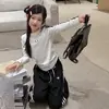 Conjunto casual de estilo coreano para niñas: conjunto elegante de camiseta de manga larga ajustada y pantalones anchos de rayas azul marino