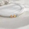 Nuevo Colgante de Collar de 26 Letras Color Oro Rosa Doble Agujero Horizontal Más Vendido en Europa y América Accesorios de Collar Sencillos de Acero Inoxidable
