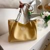 Bolso Tote de PU Transfronterizo 2023 Nuevo Diseño Nicho Moda Simple Gran Capacidad Hombro Casual Bolso de Mujer