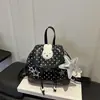 Mochila casual de bolinhas de nicho estilo coreano para mulheres, nova mochila de coelho de desenho animado 2026, bolsa de viagem para estudantes