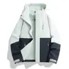 Chaqueta exterior 3 en 1 estilo Luotuo para mujer con forro polar desmontable, chaqueta de montañismo cortavientos e impermeable para hombre