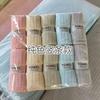 Sello de cintura de tejido de punto por urdimbre de vellón de coral de fábrica, puesto absorbente, algodón de Xinjiang absorbente, cara gruesa, cabello seco, generación de cabello en vivo