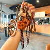 Miu Anillo de Llavero de Pan con Agua Alcalina Resina Pan Colgante de Llavero de Bolsa de Chocolate Regalo de Graduación
