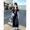 Conjunto de Verano de Dibujos Animados 2026 Dulce Lindo Gato KT Camiseta de Manga Corta Informal Pantalones de Pierna Ancha con Parches a Cuadros Conjunto de Dos Piezas