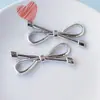 Lindos accesorios de gato plateado accesorios accesorios para el cabello zapatos con agujero material de bricolaje fábrica mayorista ventas directas