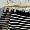Estilo Retro Elegante de Invierno 2025 Falda de Rayas Gruesas Moda Estilo Perezoso Cintura Elástica Ceñida al Cuerpo para Mujer