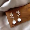 Pendientes coreanos de plata 925 con forma de ojo de gato y flor, transparentes y exquisitos, de moda, con el mismo estilo de las celebridades de Internet.
