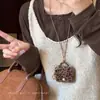 Bolsa para Auriculares de Felpa con Estampado de Leopardo Retro Otoño e Invierno Cadena de Suéter con Cuello Halter de Diseño de Nicho Versátil Colgante Cubierta para Auriculares