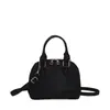 Bolsa feminina 2023 primavera novo estilo coreano moda retrô portátil shell bag simples casual ombro messenger bag para as mulheres