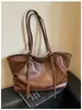Bolsa de ombro casual transfronteiriça para mulheres, nova bolsa de mão retrô simples, bolsa tote de grande capacidade para trabalho e deslocamento