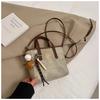 Bolso de gran capacidad para mujer, combinable con todo, primavera y verano 2025, nuevo bolso bandolera informal, bolso de mano retro para uso diario.